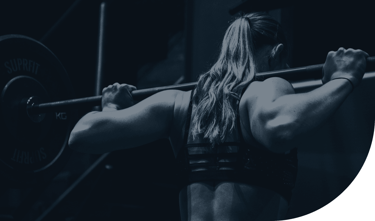 Woman holding bar